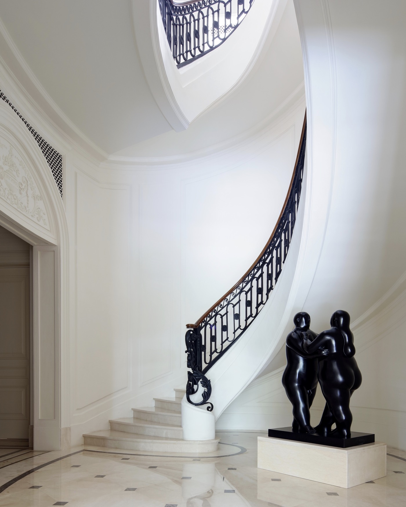Singapore marble spiral staircase with Botero sculpture